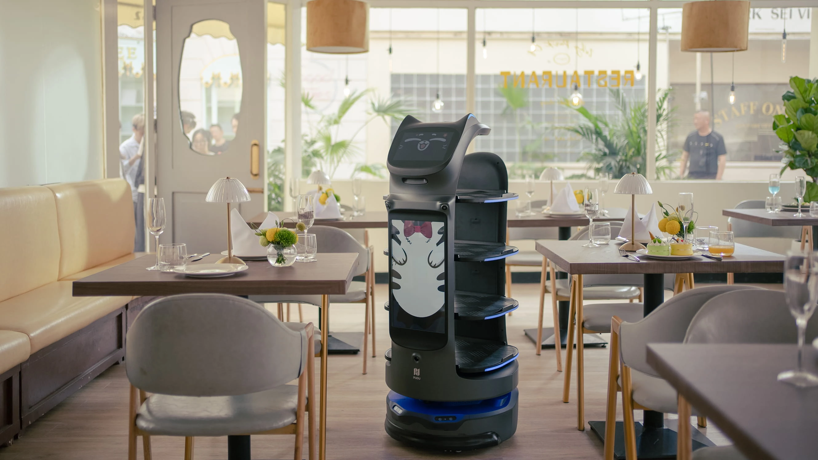 PUDU robot supporting operations in a commercial space.